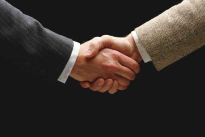COVID-19: Long Island Diocese Bans Handshakes