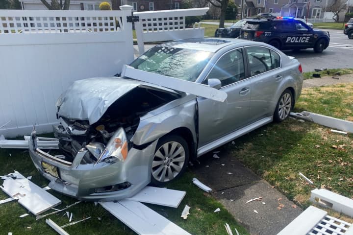 Crash Sends Sedan Through Fair Lawn Homeowner's Fence