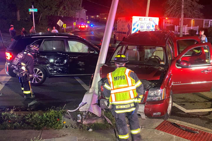 SUVs Collide, Topple Traffic Light In Midland Park