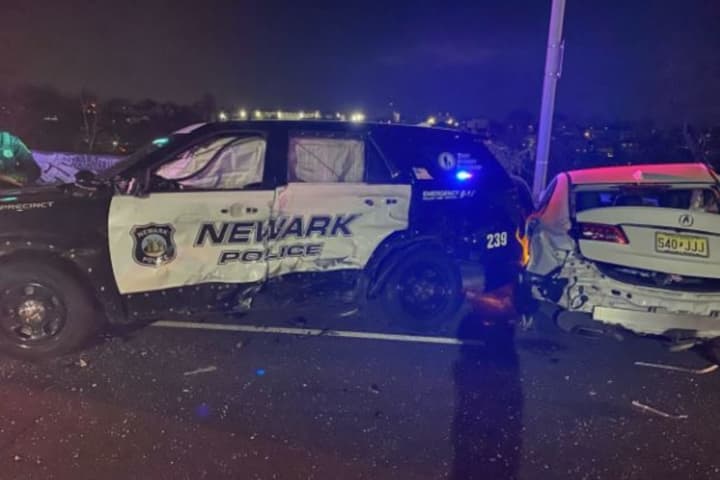 Newark Police SUV Struck By Speeding Car At Crash Scene Injuring 7