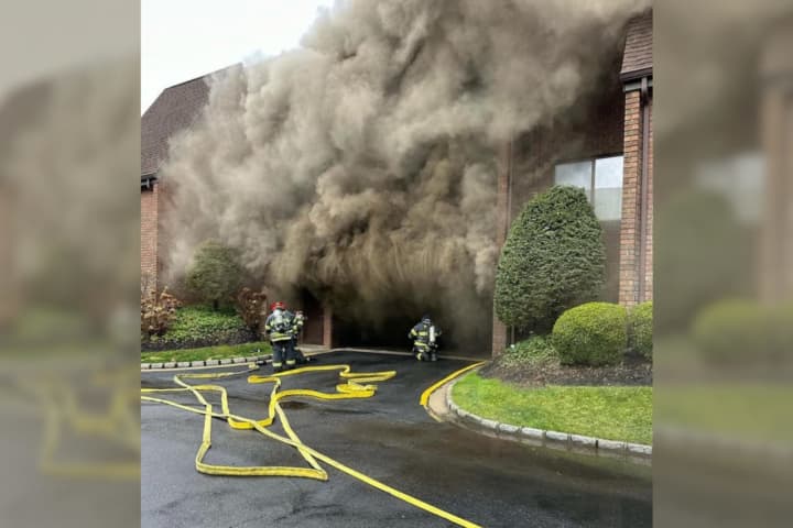 Several Departments Battle North Hills Condo Fire