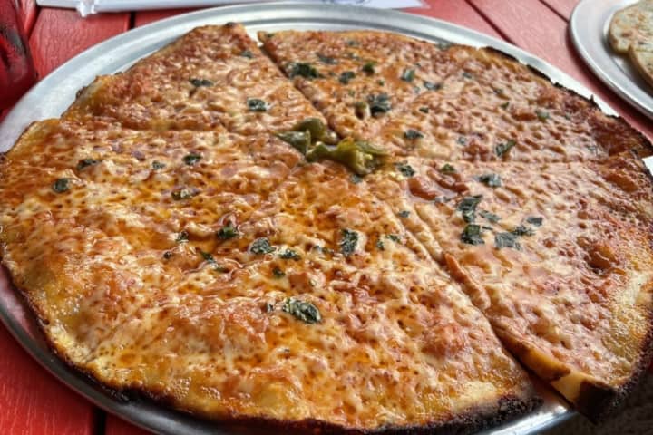 Pizzeria With Two Long Island Locations Praised For 'Paper-Thin Crust'