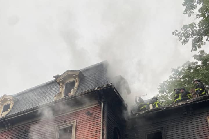 (DEVELOPING) Firefighters Battling Three-Story Home In Roxbury