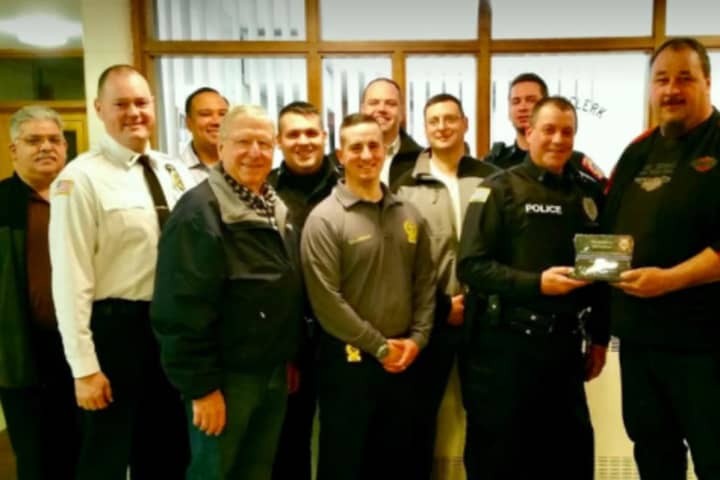 Area Man Honored For Heroism In Rescuing Officer From Drunk Driver