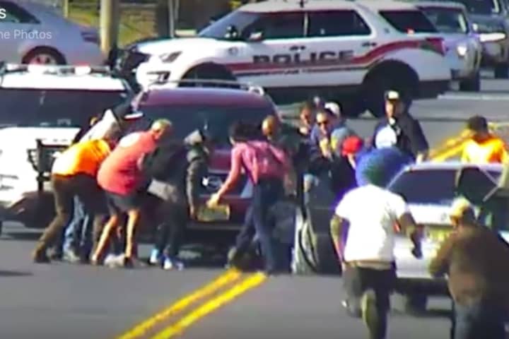 Neptune Township Police Thank Bystanders Who Helped Free Bicyclist Pinned Under SUV
