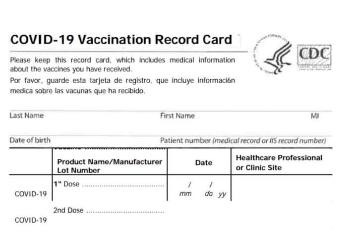 COVID-19: Have Your Completed Vaccine Card? Here's What To Do Now, Whether To Laminate It