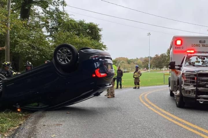 Car Flips, Lands On Roof After Striking Rock Wall In Morris County: Police (PHOTOS)