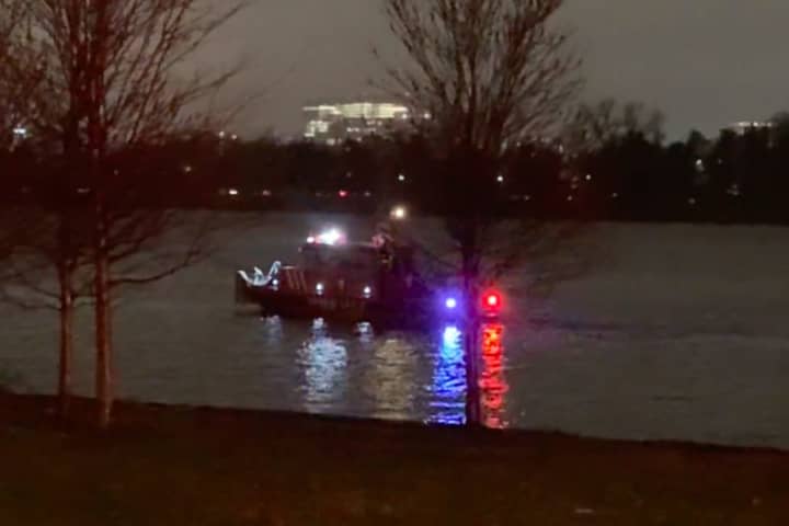 Woman With Jacket Zipped Over Face Rescued From Potomac River