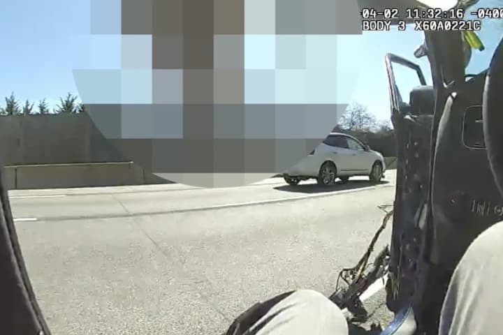 Passing Car Takes Door Off Police Cruiser In Region: Video