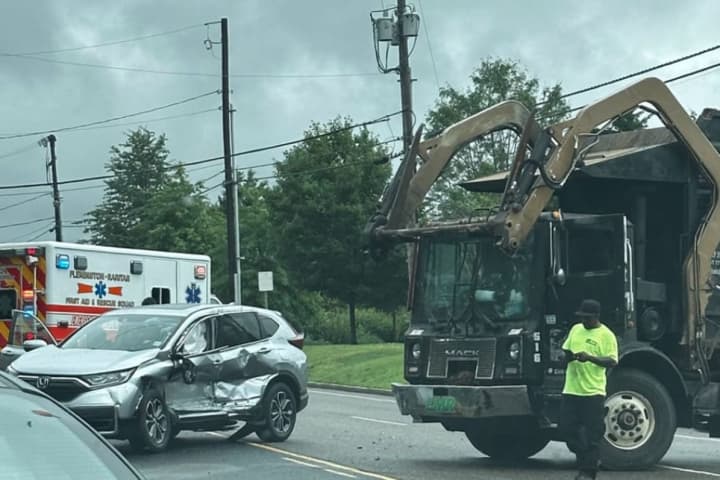 Driver Freed With Hydraulics, Hospitalized After Crash With Garbage Truck In Hunterdon County
