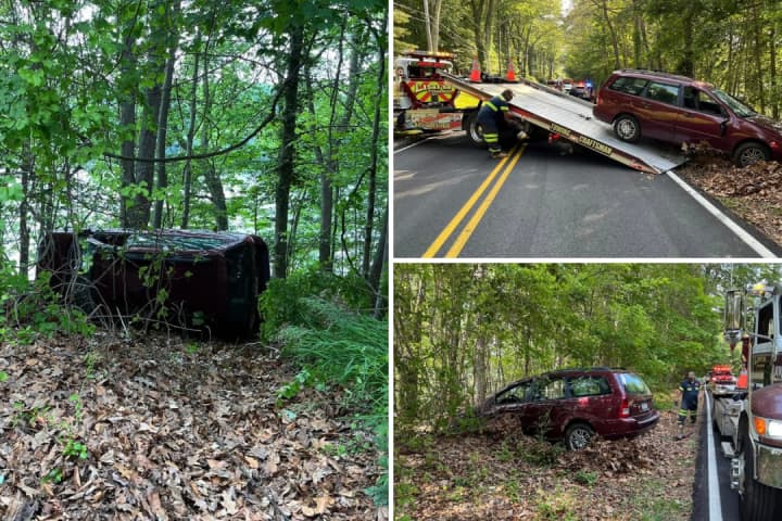 Vehicle Crashes Into Woods, Flips On Its Side In Somers