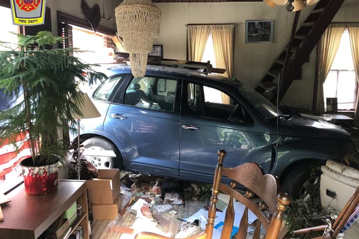 Car Slams Into Lancaster Home, Parking In Living Room (Photos)
