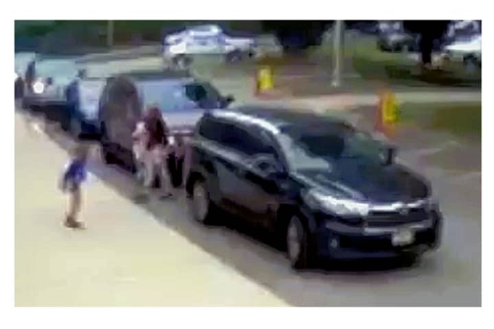 WATCH: Park Ridge Special Officer Snatches Child Before She's Pinned By Moving Car (Video)