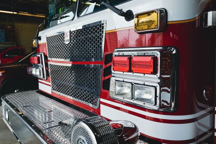 Firefighter Injured After Smoldering Fireworks Left In Hicksville Dumpster