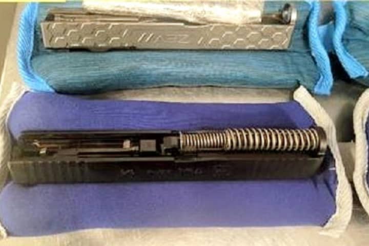 Man Had Gun Parts 'Artfully' Hidden In Ankle, Wrist Weights At Newark Airport, TSA Says
