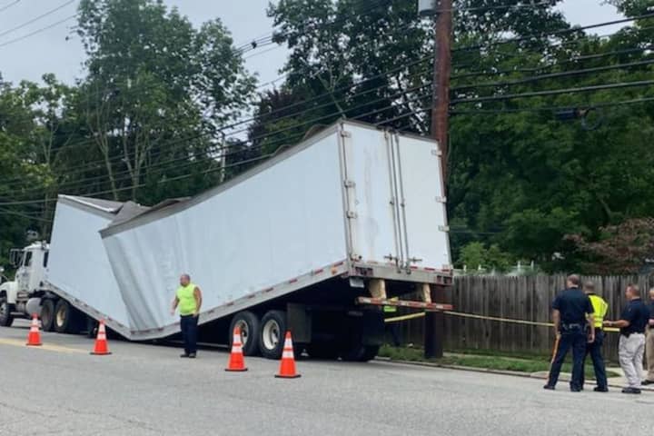 Trailer In Washington Township Gives Way Under Weight Of Scrap