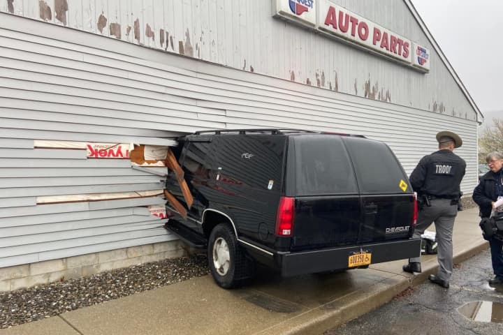 Driver Rescued After SUV Crashes Into Auto Parts Store In Region