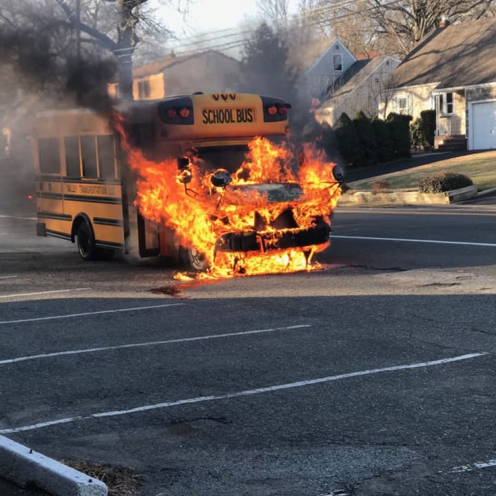 A bus driver got both of his occupants off before it erupted in flames in Cresskill, police said.