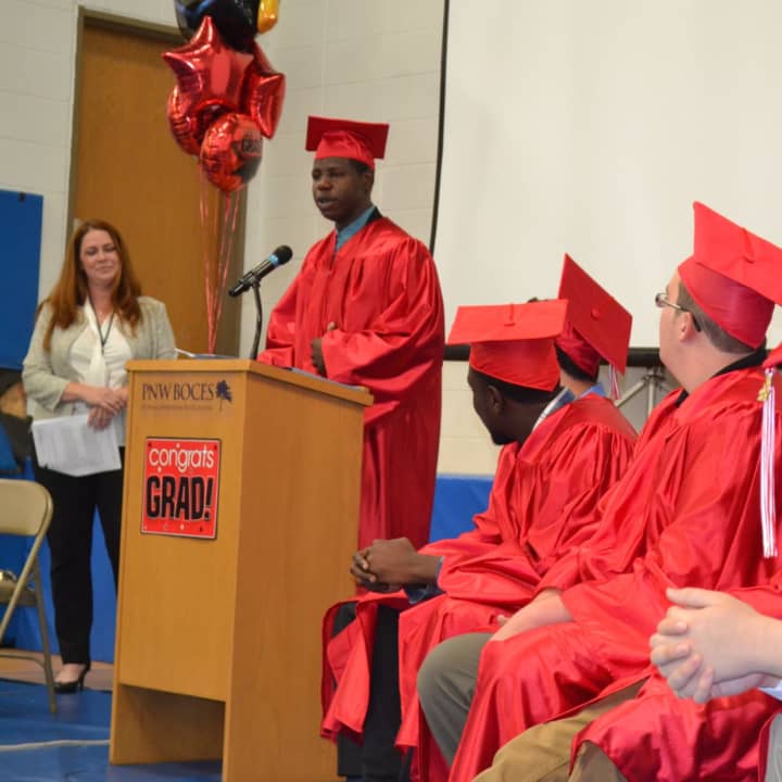 Fox Meadow Graduation Davonte Hudson: Davonte Hudson delivering the Senior Comments at Fox Meadow High School’s graduation ceremony at PNW BOCES in Yorktown Heights as Principal Nicole Murphy looks on.