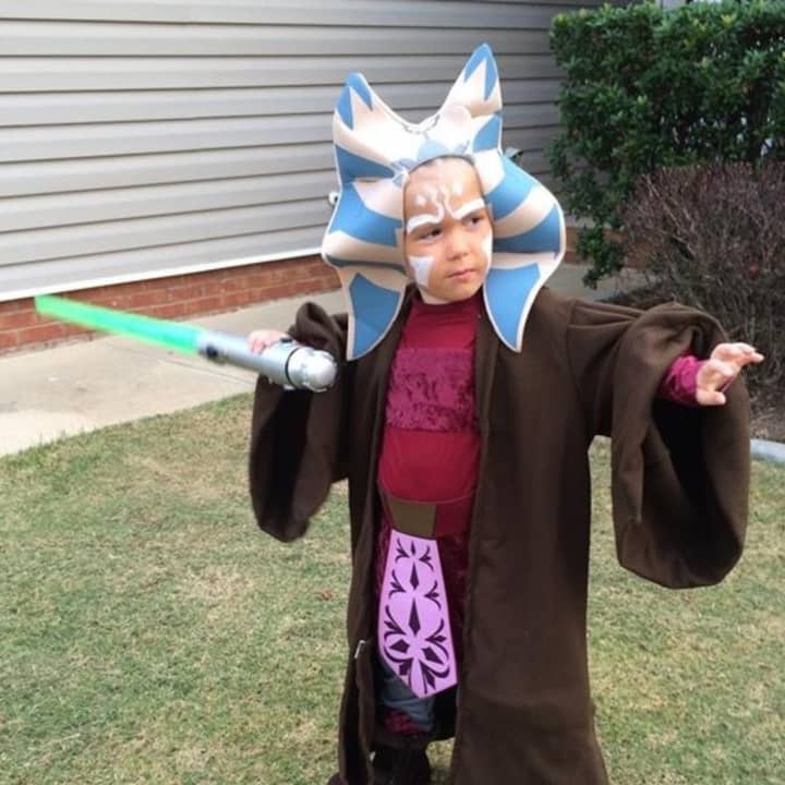 The Oakland Public Library is raffling off Star Wars toys to go with costumes like this one.