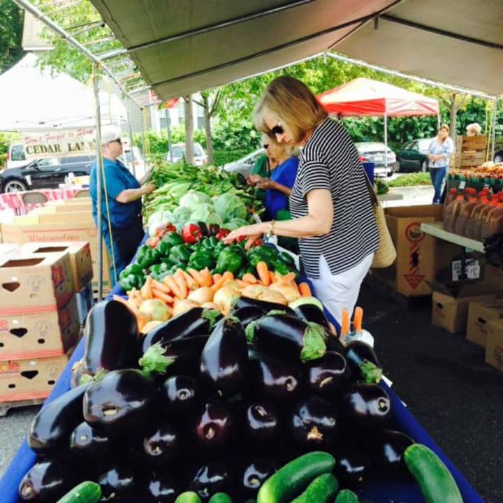 Shoppers browse at the Teaneck Farmer&#x27;s Market.