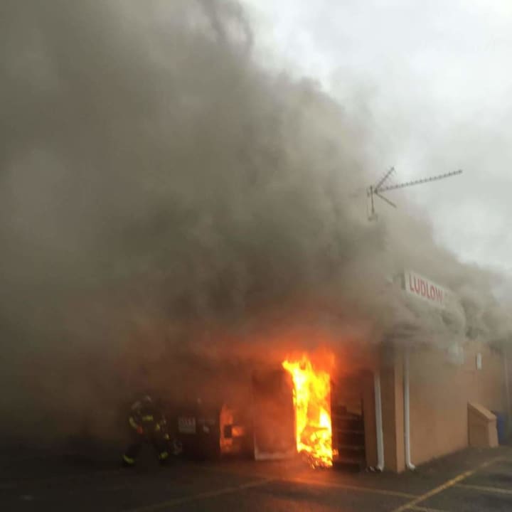 Firefighters arrived to find heavy smoke coming from the front and back of a variety store located in the middle of the strip mall.