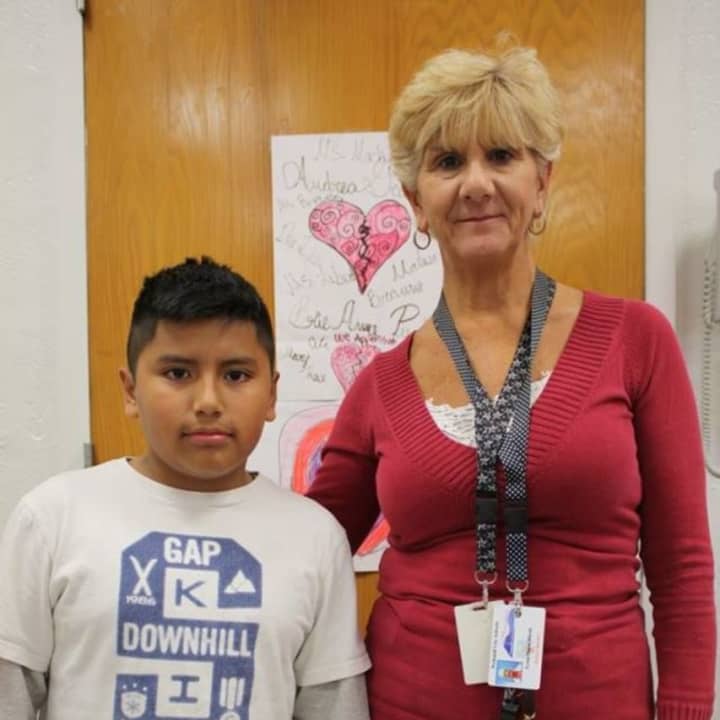 Hillcrest Elementary School Playground/Cafeteria Monitor Lynn Riccio performed the Heimlich maneuver on Alex Loja when he choked on a piece of food in the cafeteria.