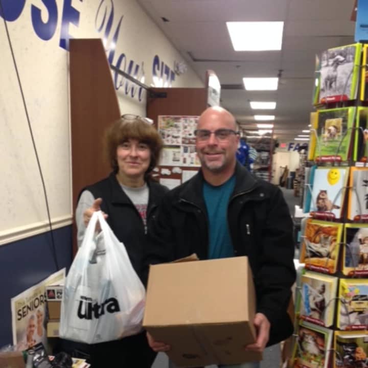 People donate to the 4 Paws Pet Food Pantry in Pompton Lakes.