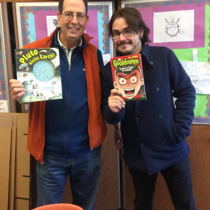 Book authors Steve Metzger and Dave Roman visited Daniel Webster Elementary School in New Rochelle this week to share how they write and illustrate their books and to answer student questions. 