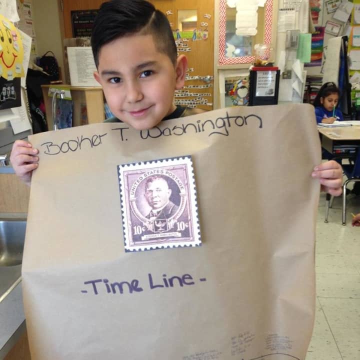 A student learns about Booker T. Washington.