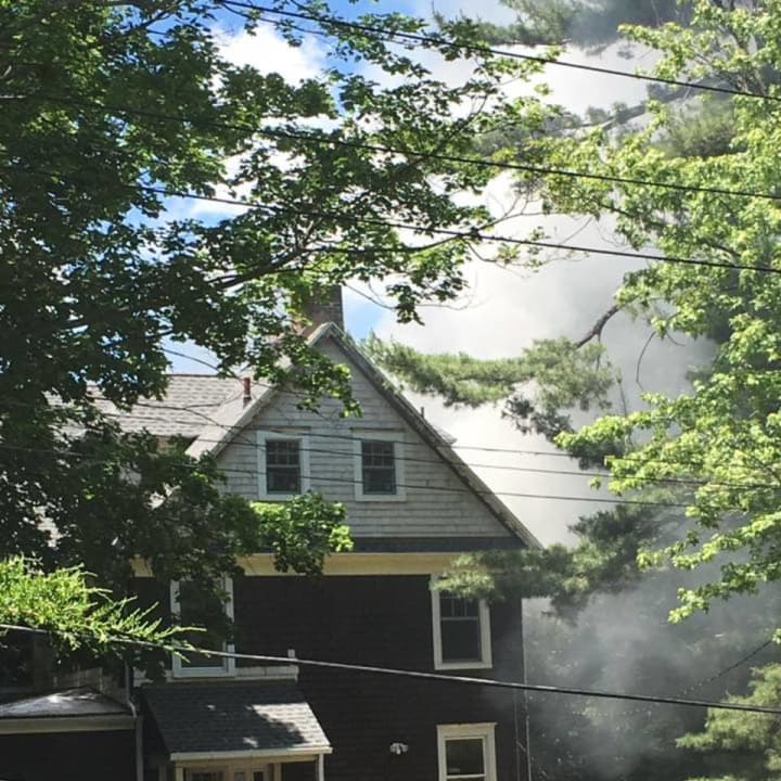 Firefighters are at Rose Hill Avenue in Tarrytown battling a structure fire.