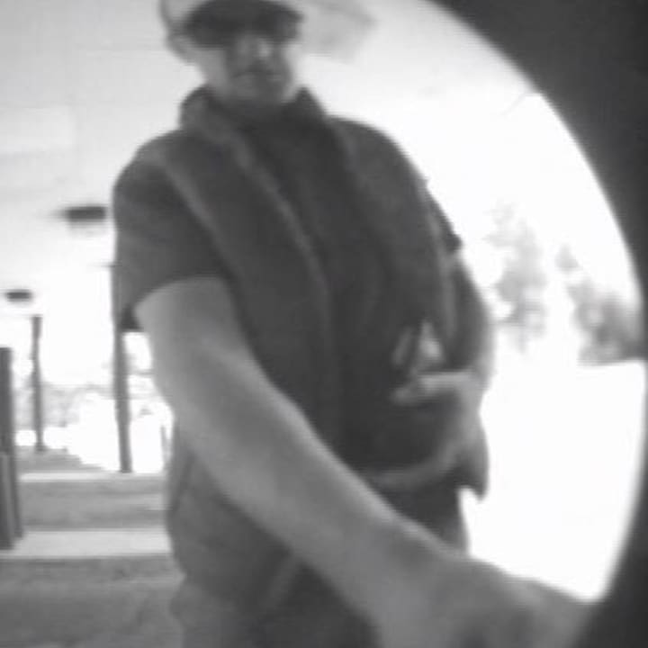 Ulster police are asking for help in identifying the man pictured who attached an ATM skimming device.