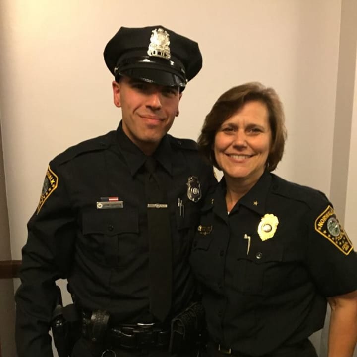 Officer James Barron stands with Deputy Chief Susan Zecca after completing the P.O.S.T. Academy.