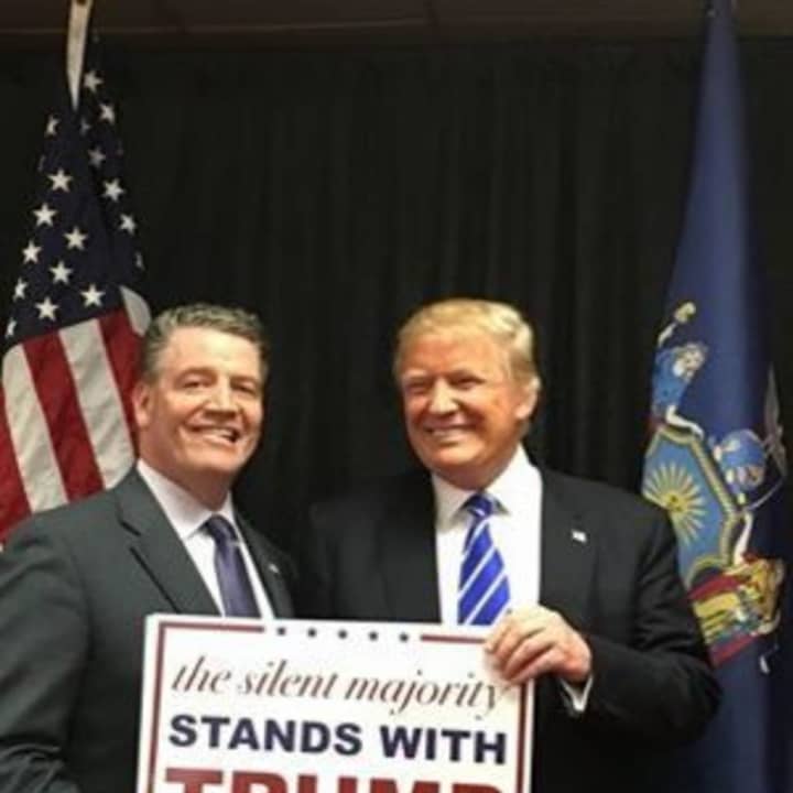 State Sen. Terrence Murphy poses with Donald Trump at a rally in Albany.