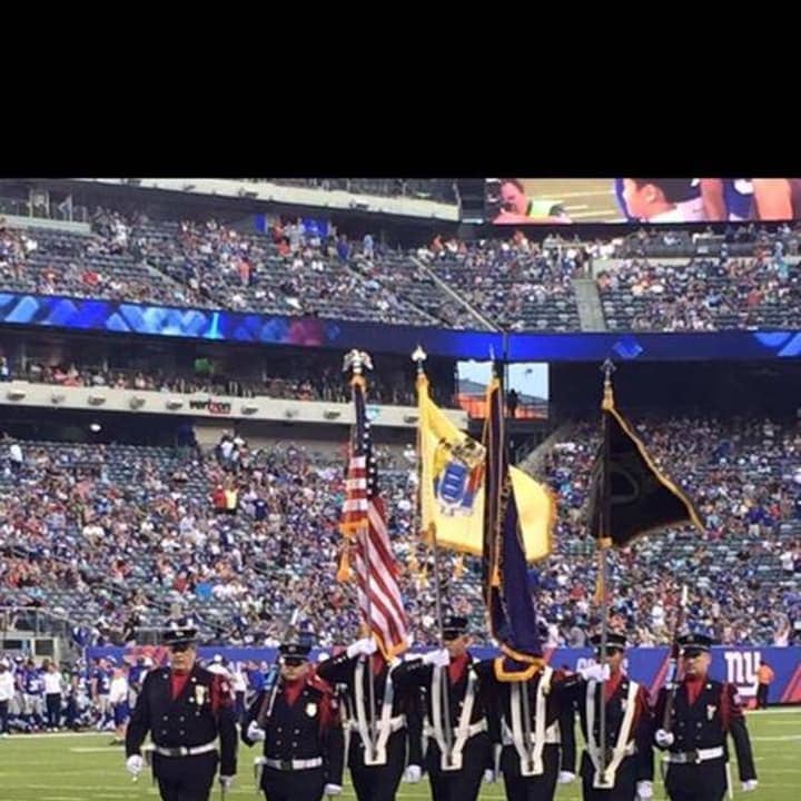 The New Milford FD Honor Guard presented the colors at MetLife Stadium Sunday evening.