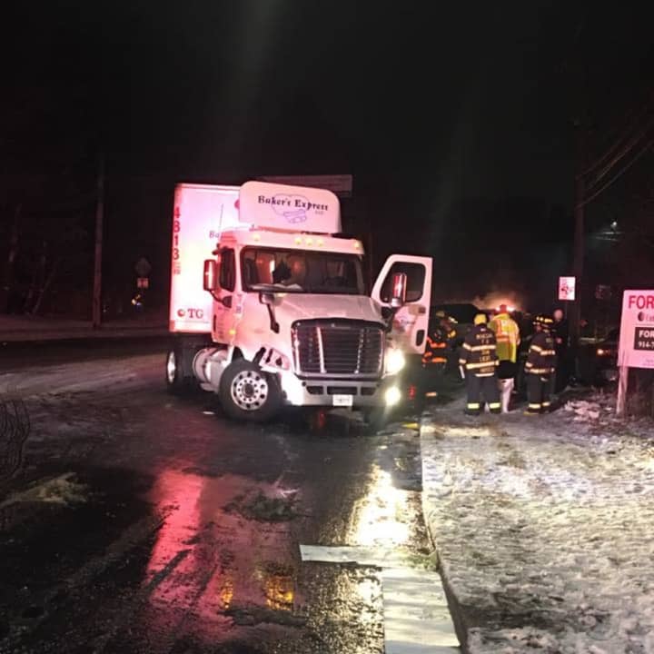 Two were injured in the head-on tractor trailer collision.