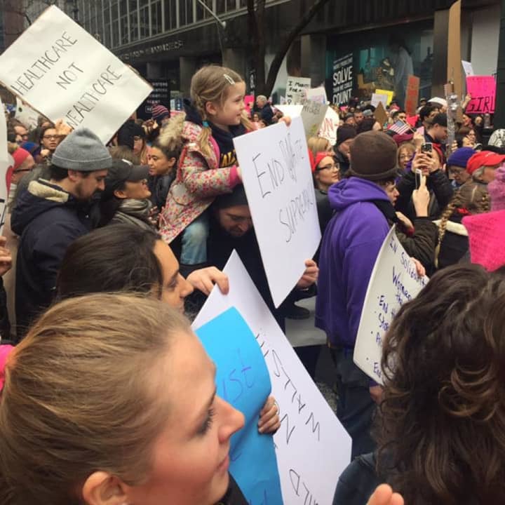 Alissa Smith of Fairfield is part of this crowd rallying Saturday in the Women&#x27;s March on New York City with people of all ages.