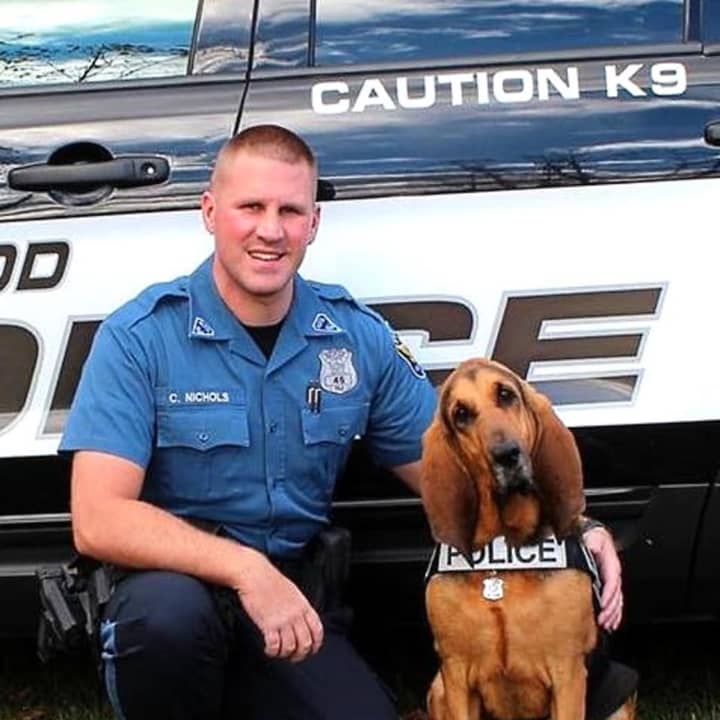 Zoey and her partner, Maywood K-9 Police Officer Chris Nichols.