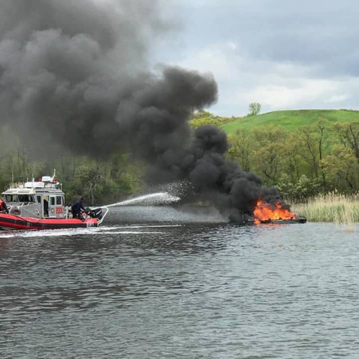 A 29-foot boat is destroyed by fire Tuesday in the Housatonic River near Sikorsky.