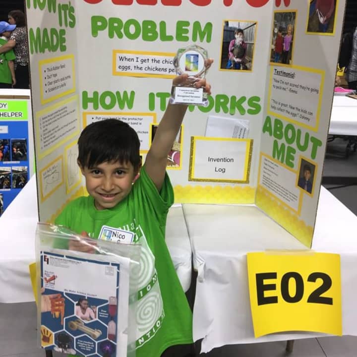 Nico LaRosa, a kindergartner at King Street Primary School in Danbury, shows off his project.