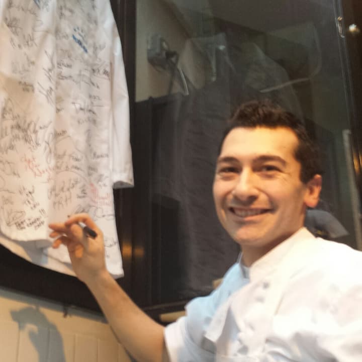 Joseph Cuccia of Lodi signs the James Beard Foundation chef&#x27;s jacket after being named a &quot;rising star.&quot;