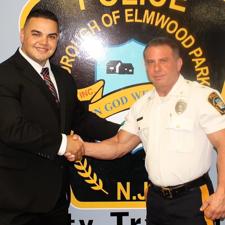 New Officer Nick Dimovski with Elmwood Park Police Chief Michael Foligno.