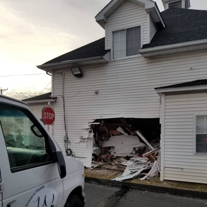Van crashes into church-owned building at 39 New Street in Danbury