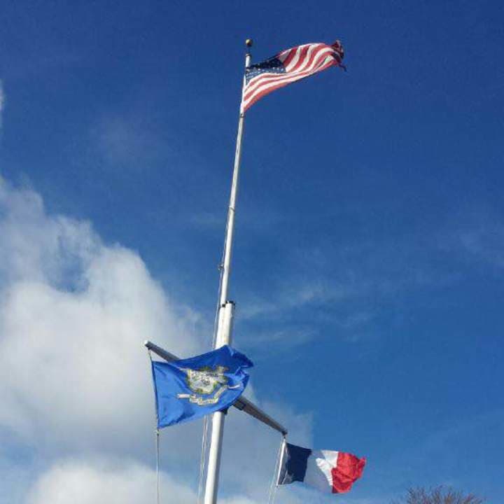 The French flag is flying at the Governor&#x27;s Residence in Hartford on Saturday with the Connecticut flag and the U.S. flag.