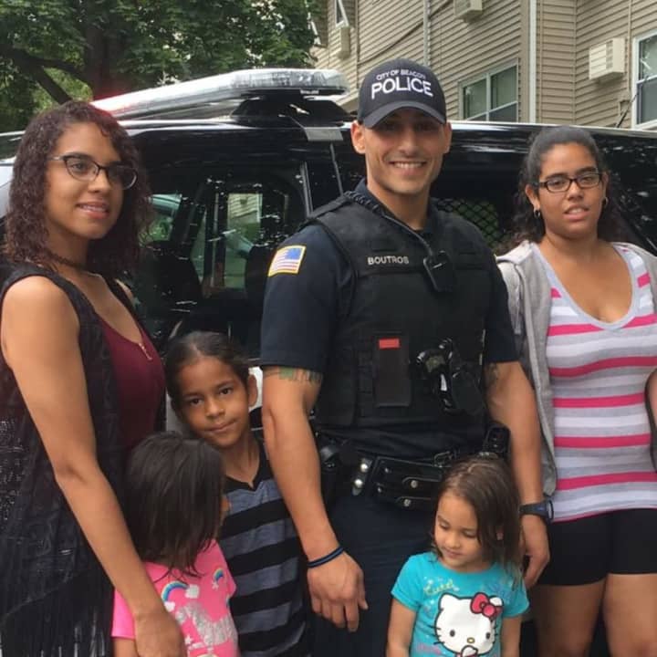 Beacon Police Officer Peter Boutros, seen here visiting a summer program in South Davies Terrace.