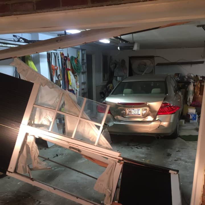 A newspaper deliveryman in Ramapo drove his car through the front of a local home on accident.