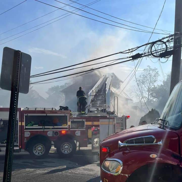 The three-story home was destroyed due to a large fire that moved quickly.