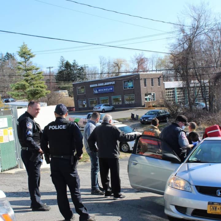A driver backed into a building, became disoriented and drove through a guard rail in Mahopac.