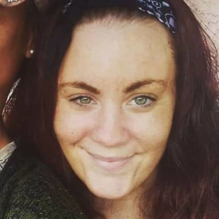 Erin Stack, 35 of Ridgefield Park, was wearing a black Johnny Cash T-shirt, a gray sweater, black and white leggings, black Converse sneakers and a blue bandana headband.
