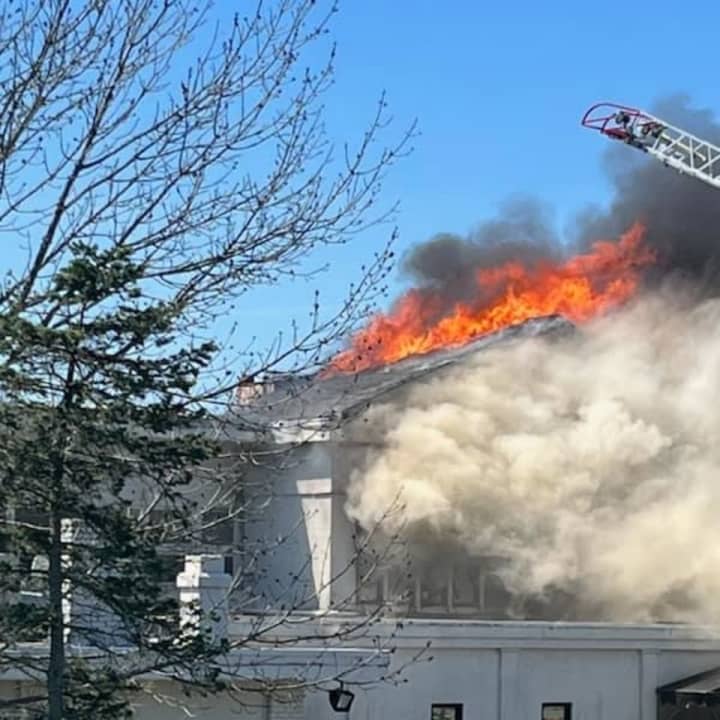 Firefighters fight a blaze at Hawthorne Country Club on May 7, 2023. A man was arrested on Thursday, March 28, for allegedly starting that fire.&nbsp;